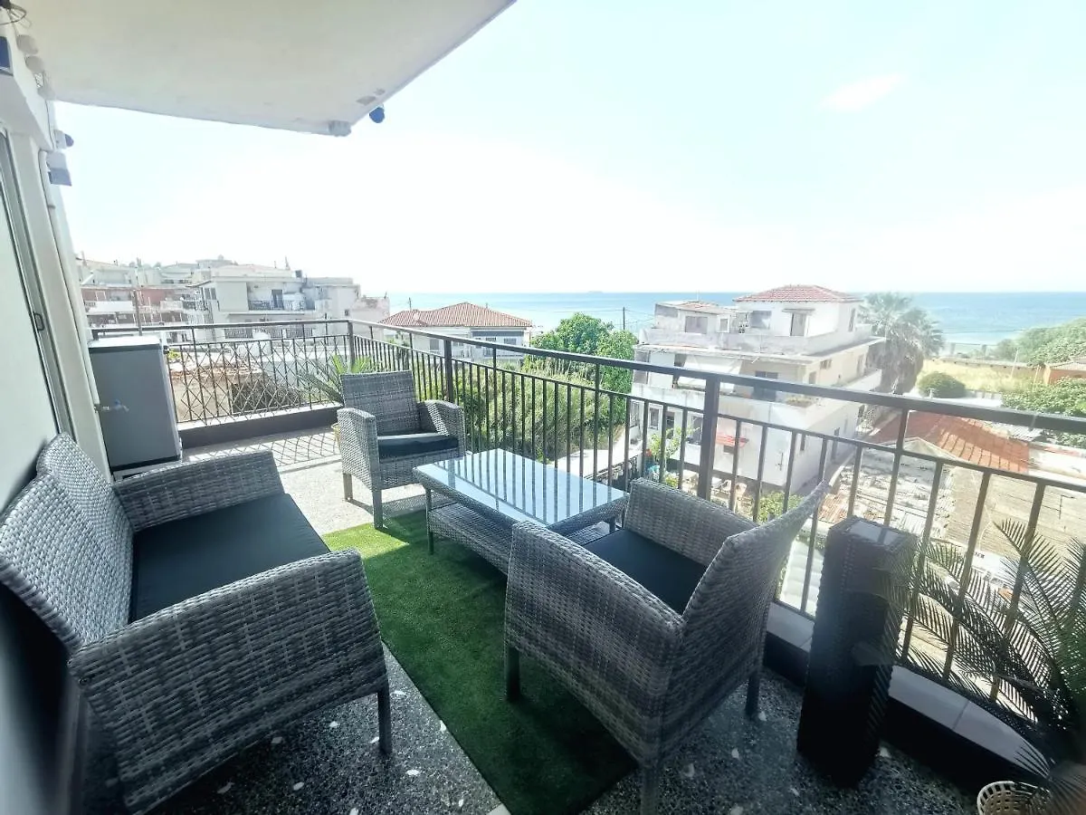 Pure Bliss: Luxury Beachfront Apartment with Panoramic Views Agia Triada